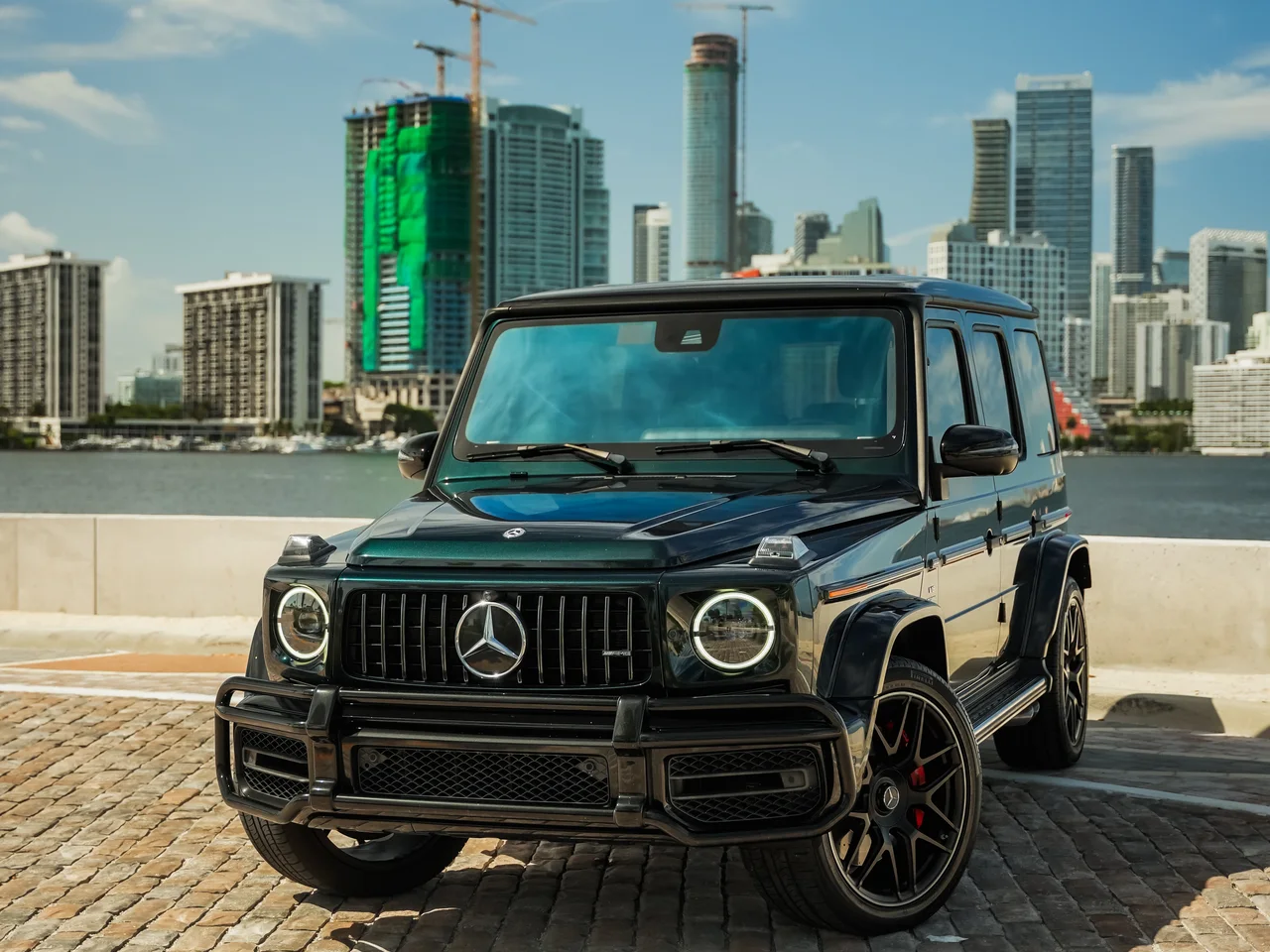 Dark metallic-green Mercedes-AMG G 63