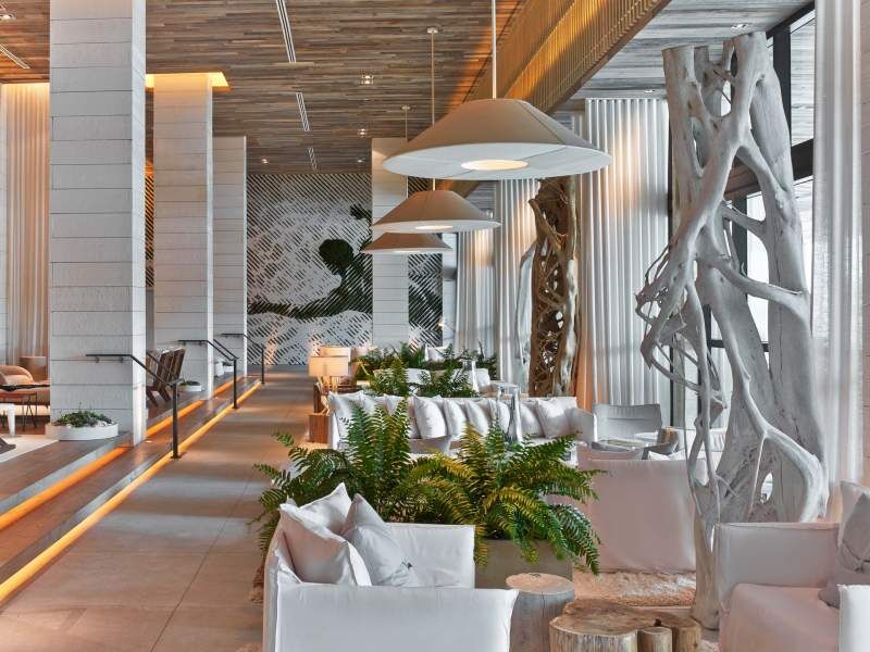 Lobby lounge in reclaimed wood and greenery