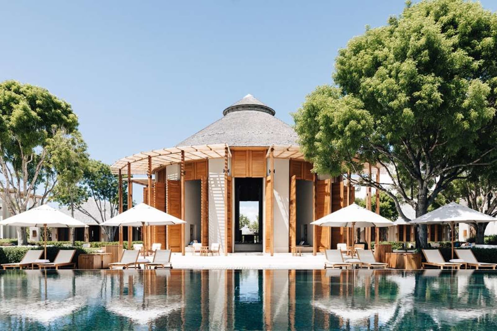 Pool and pavilion with shade umbrellas