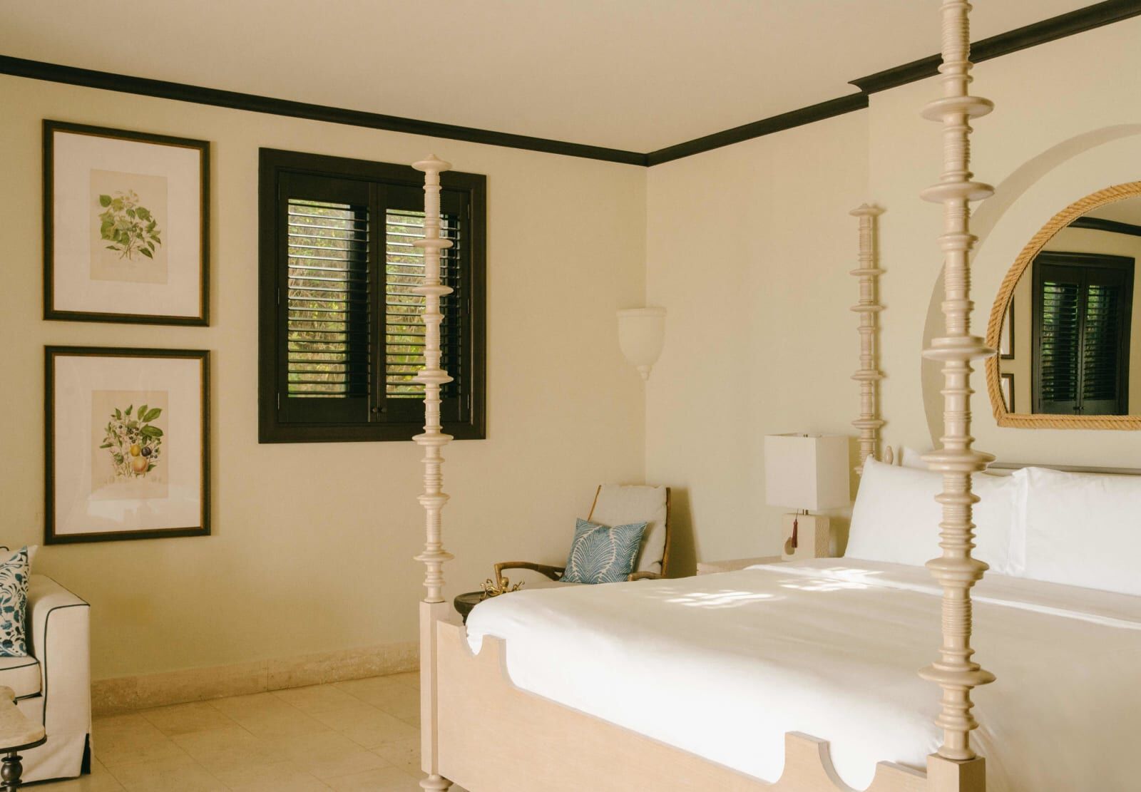 Bedroom with a carved four-poster bed