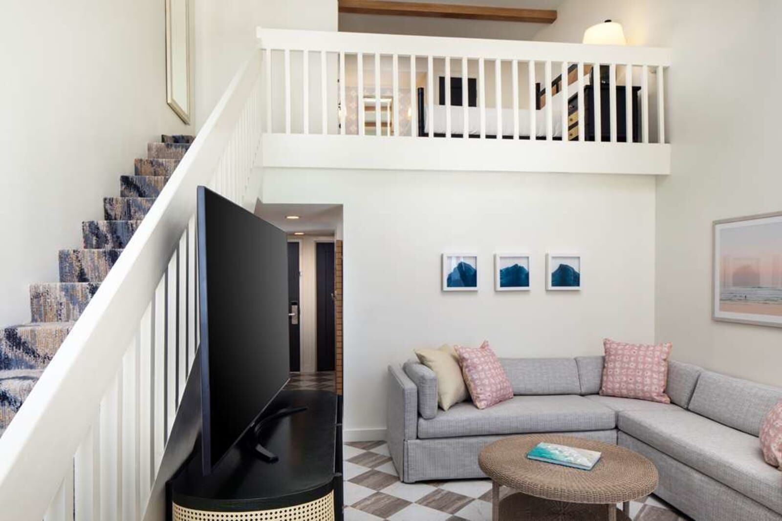 Two-level guest room with loft and living area
