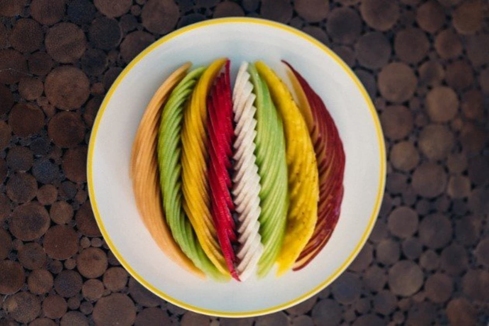 Plate of sliced tropical fruit