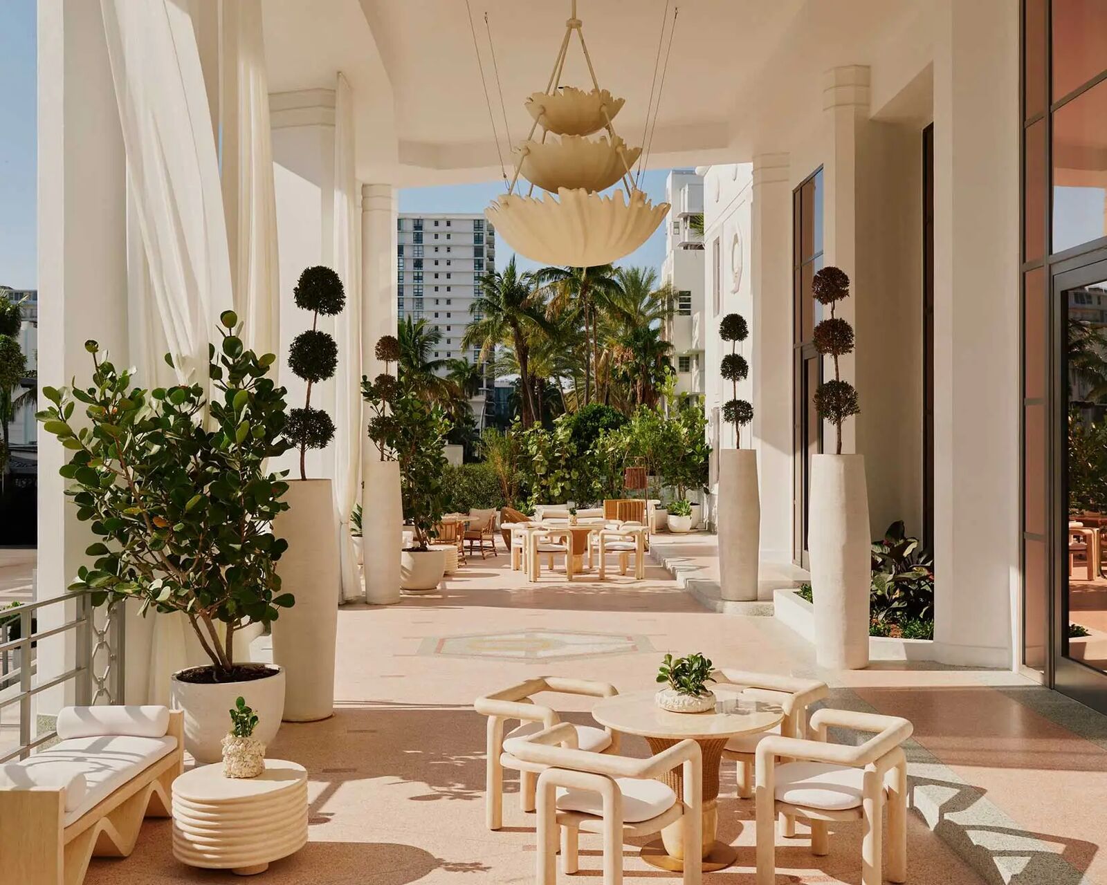 Lounge seating with potted topiaries