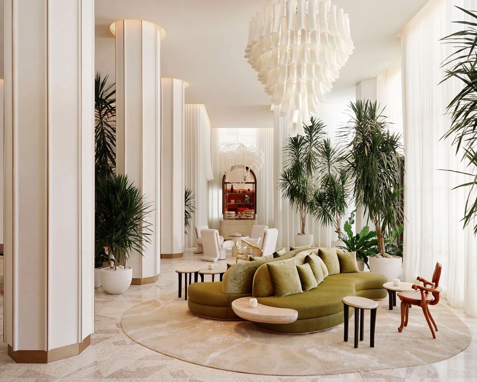 Lobby lounge with a green curved sofa