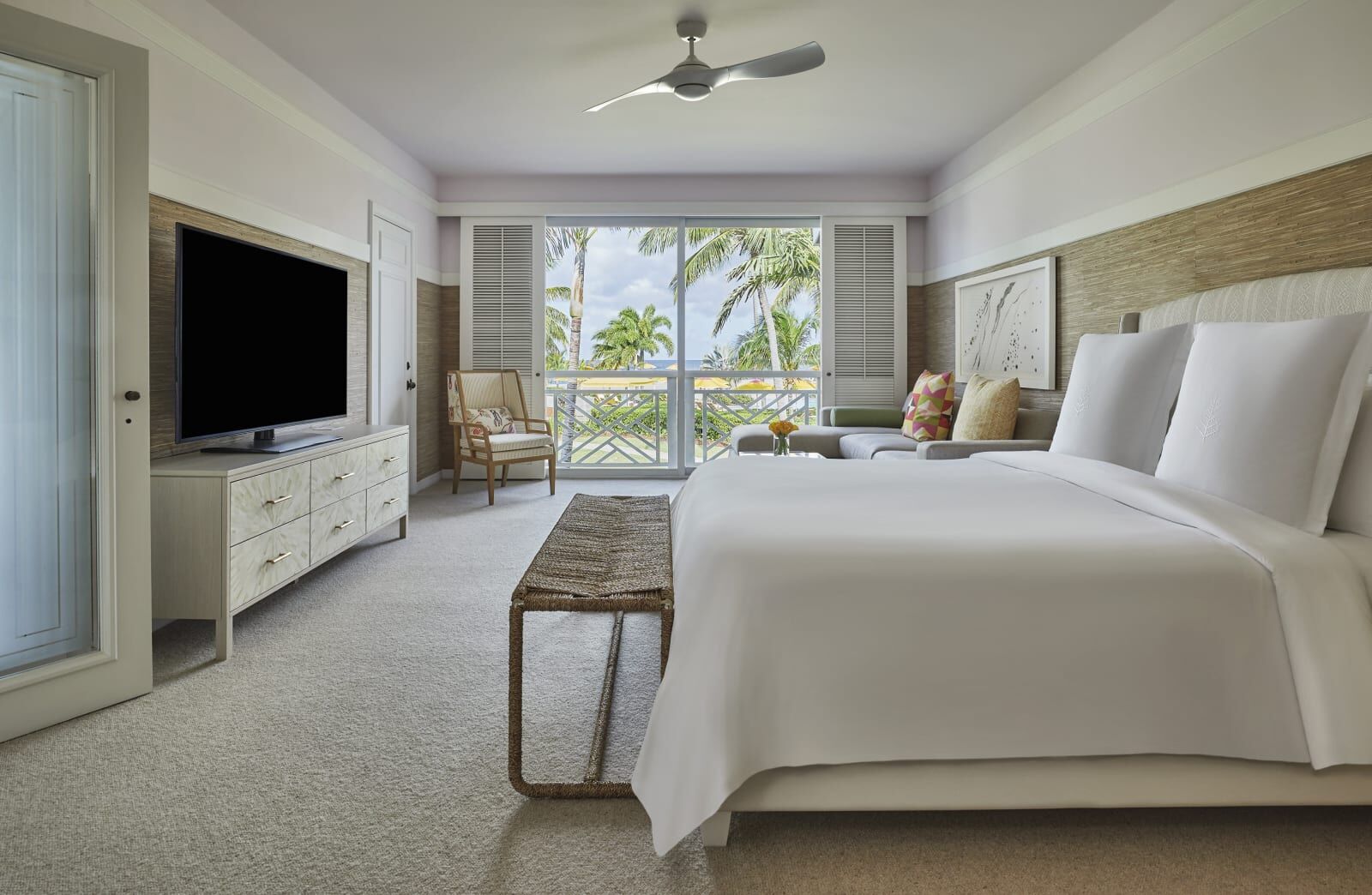 Bedroom with garden-view windows