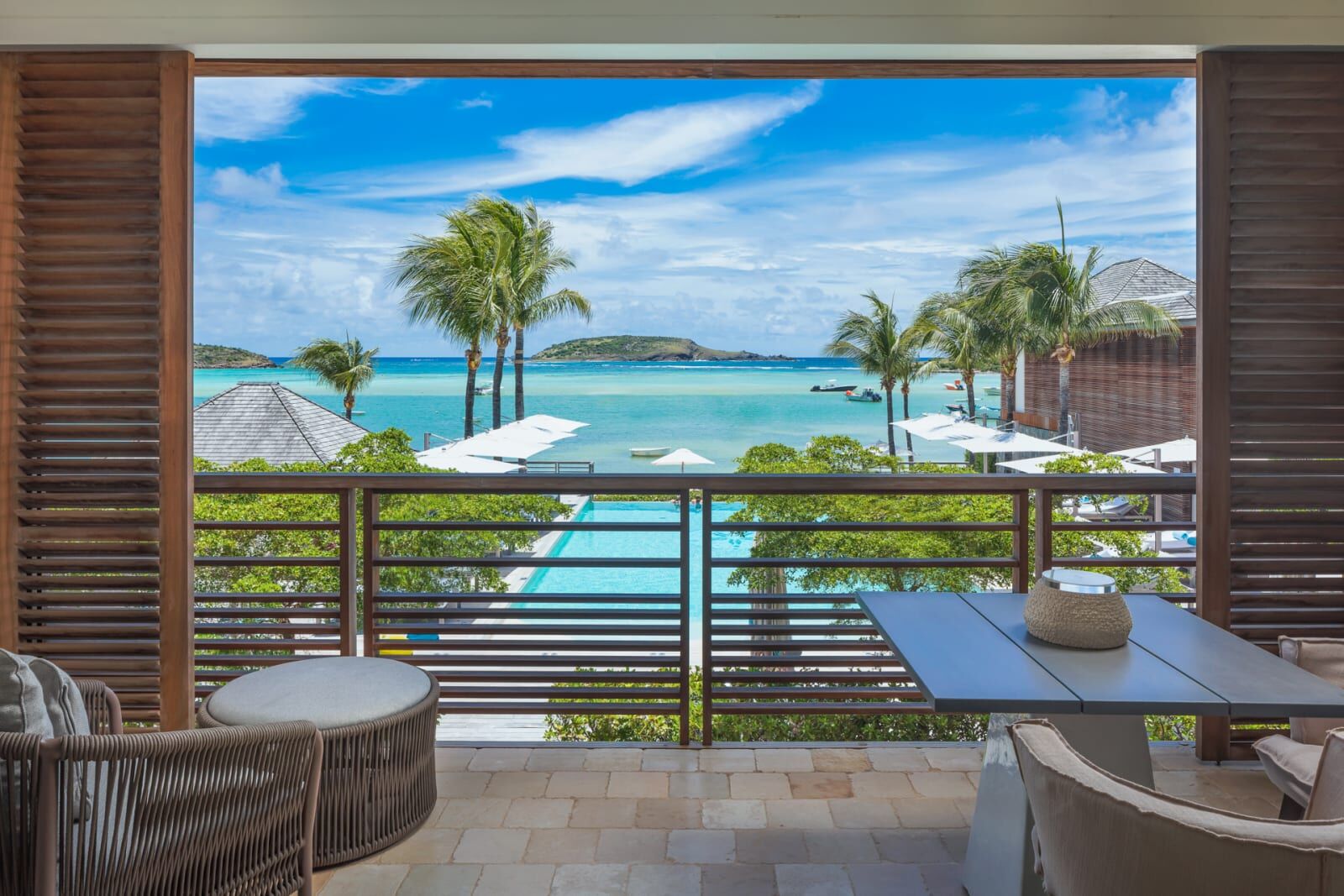 Terrace table overlooking the pool and bay