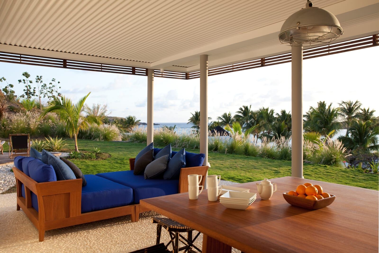 Covered terrace of one of the four-bedroom Sereno Villas, ocean view