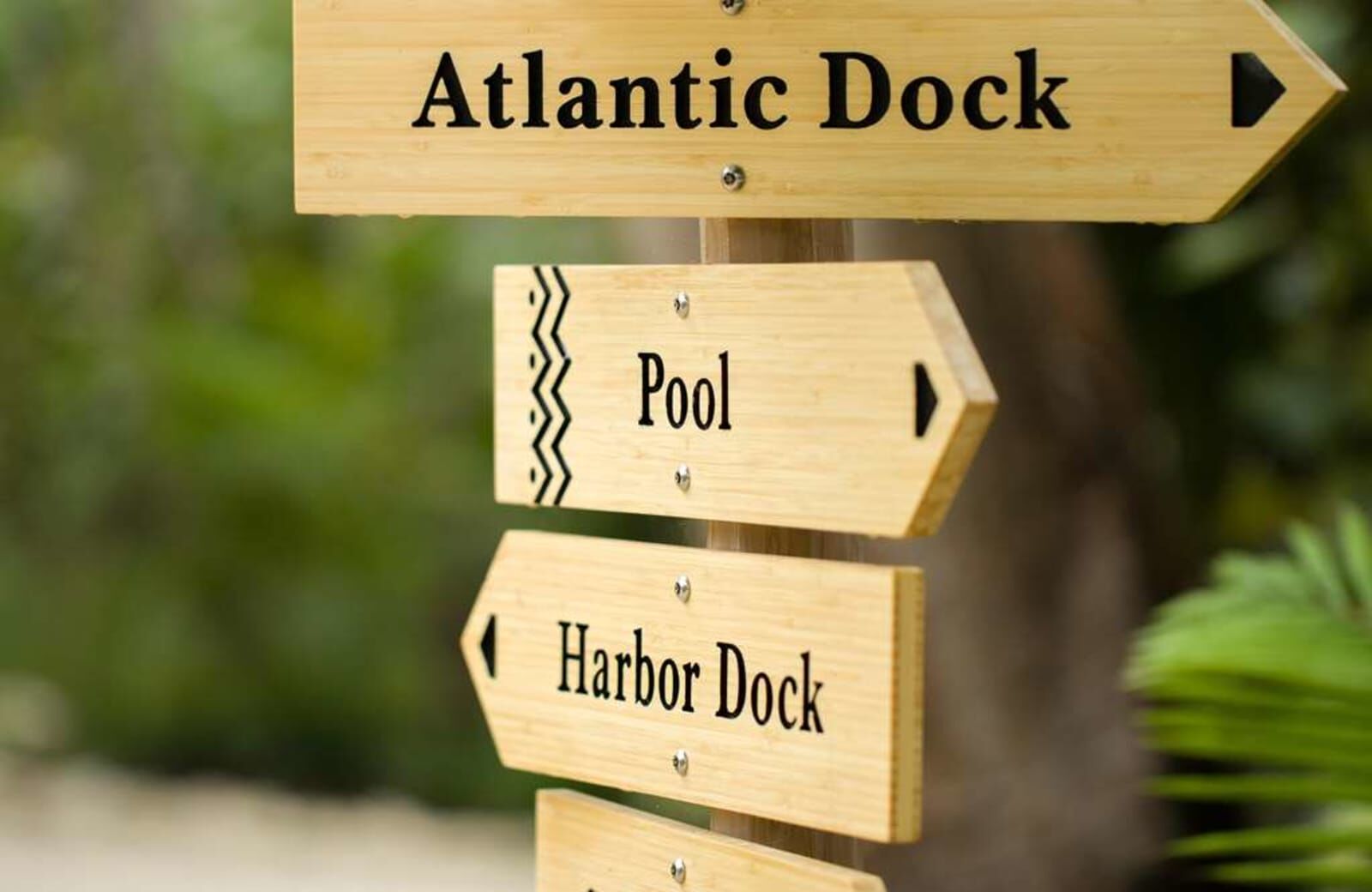 Wayfinding signs to the docks and pool