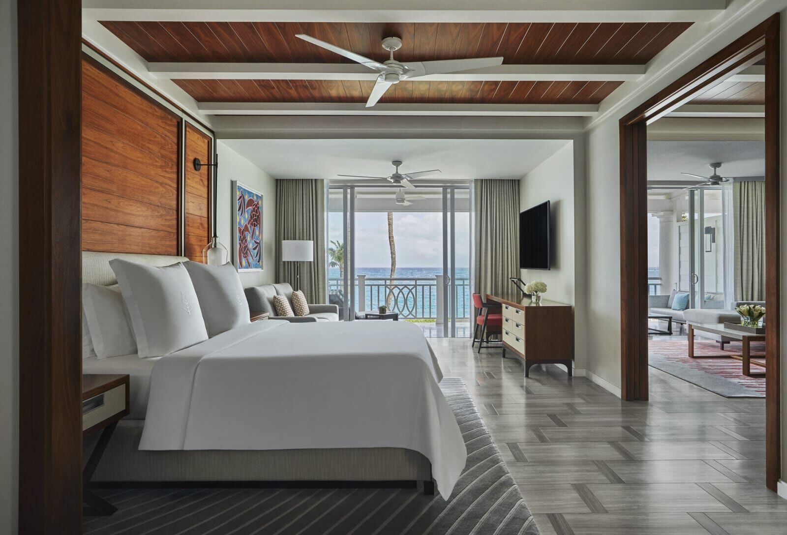 Suite bedroom opening onto a living area