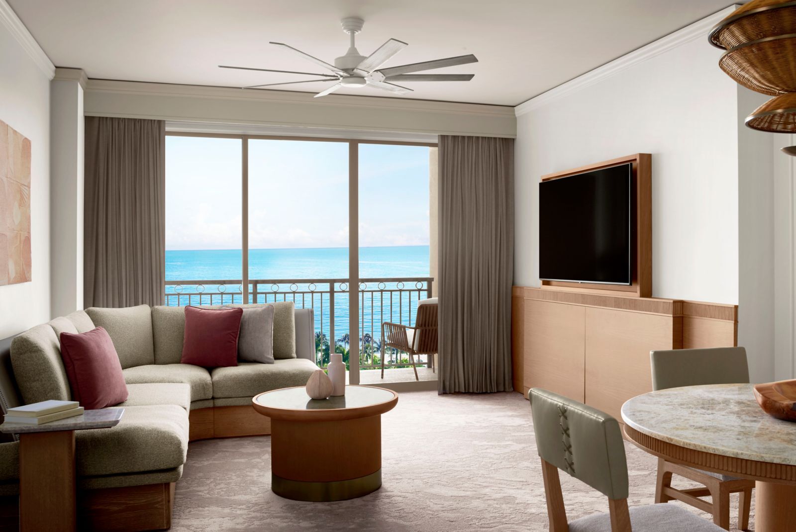 Suite living and dining room with ocean views