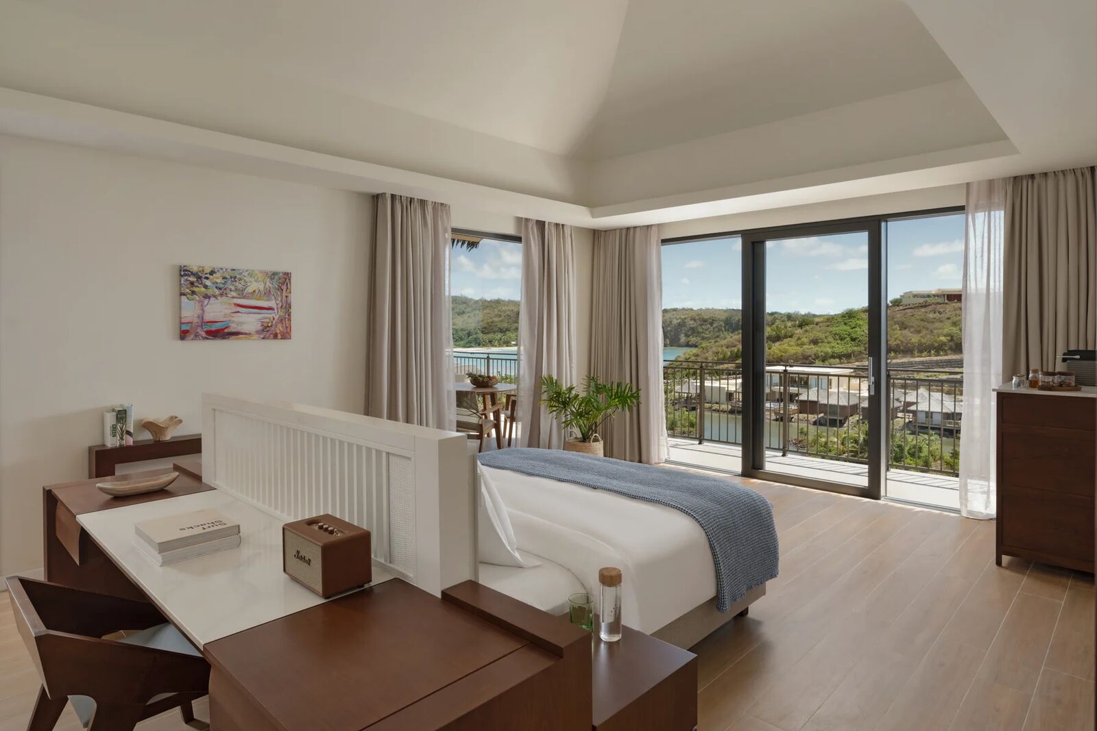 Two Bedroom Bay View Pool Villa bedroom with terrace doors