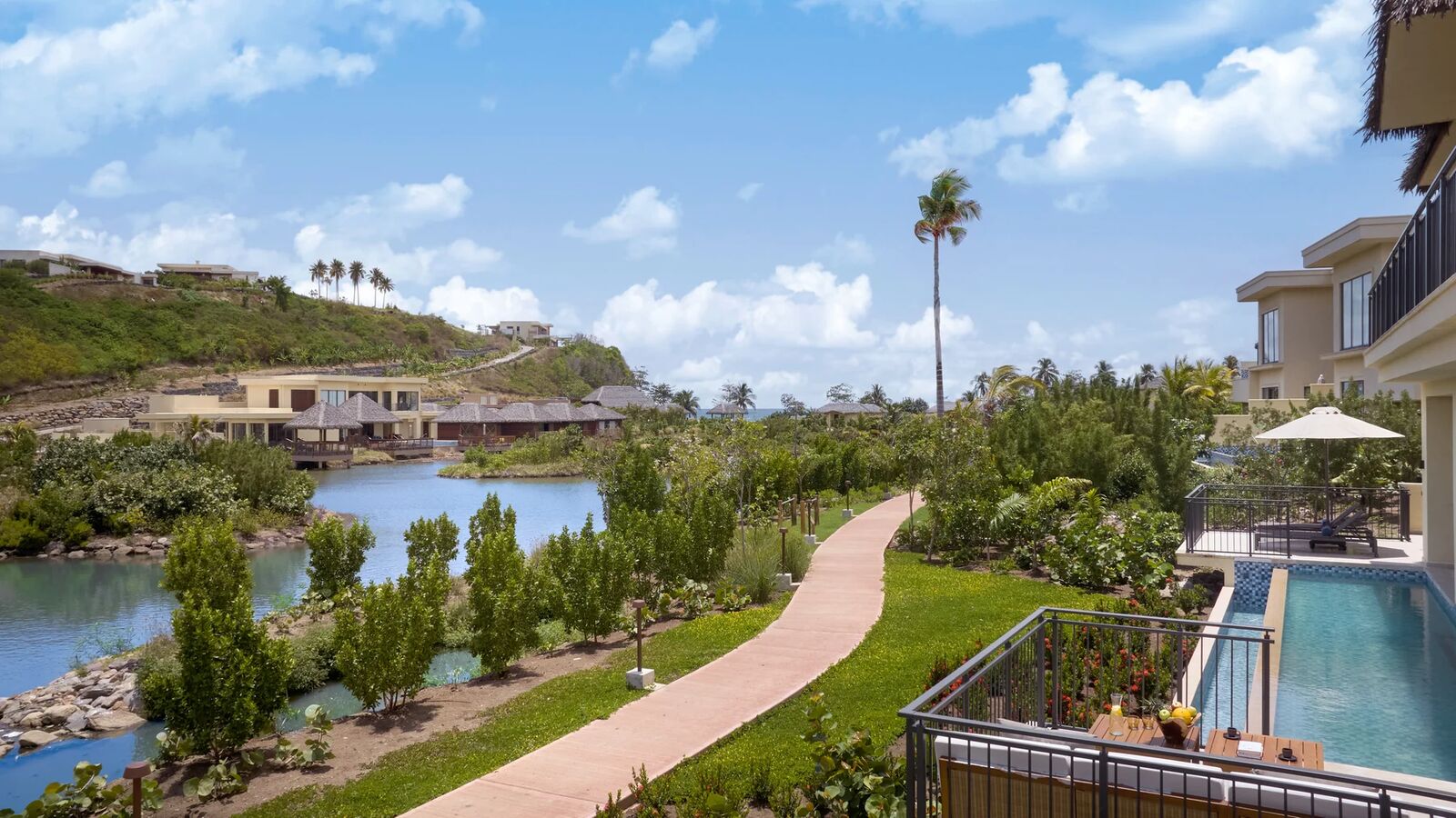 Two Bedroom Bay View Pool Villa exterior with pool terrace above the lagoon