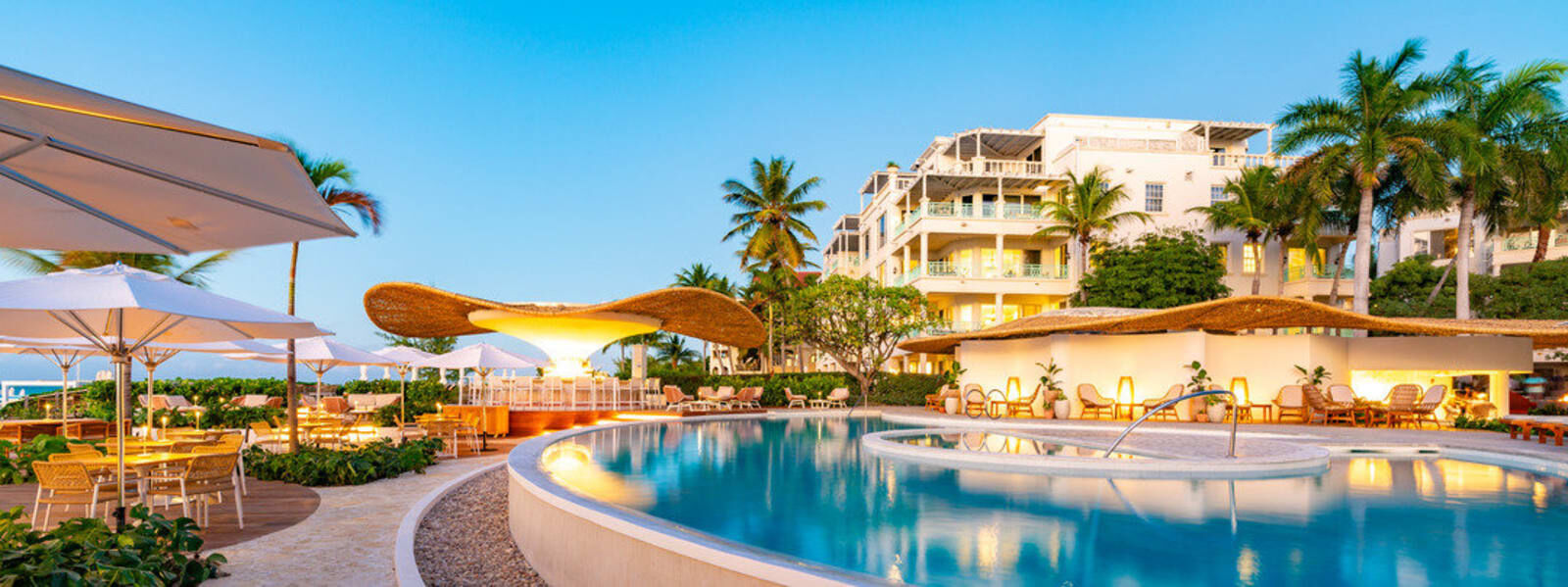 Pool with the resort buildings beyond