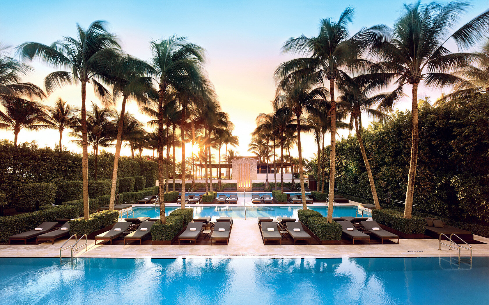 The three pools and palms at The Setai, Miami Beach, at sunset